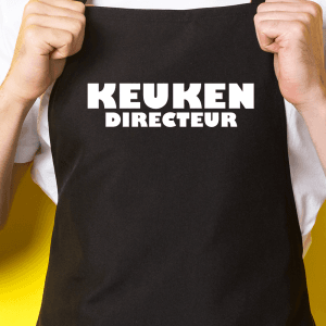 Zwart keukenschort / BBQ-schort met tekst | Keuken directeur